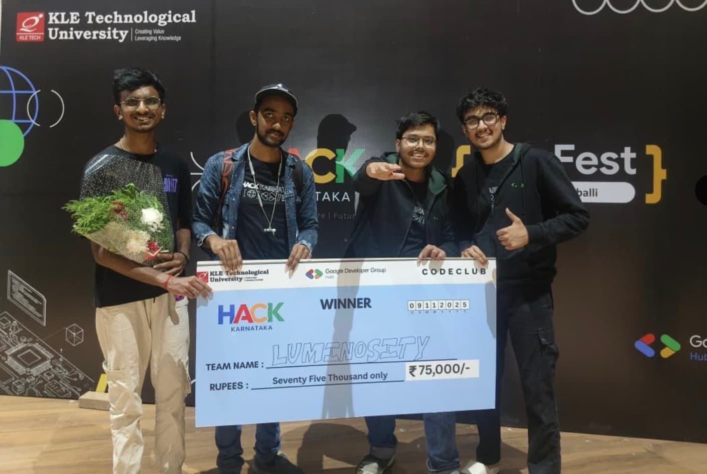 The Luminosity team receiving the Hack Karnataka 2025 winner award