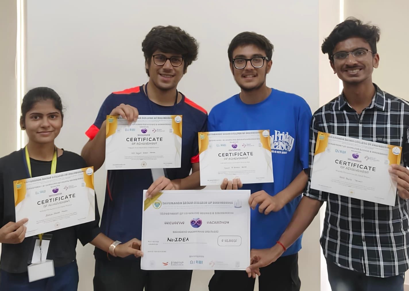 The EmpowerCredit team holding their Recurzive 2024 certificates